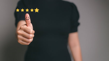 Customer satisfaction concept. Hand with thumb up Positive emotion smiley face icon and five star...