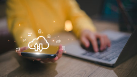 Uploading documents from folder. Open File folder with flying blank documents. Data transfer backup, File Sharing, Document Transferring conceptの写真素材