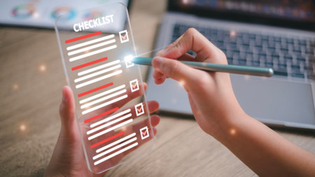 Checklist concept, Women check marks on the check boxes with marker red on the futuristic virtual interface screen.の写真素材