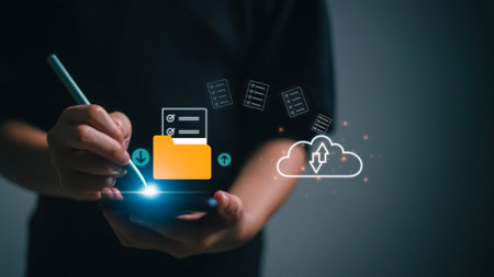 Document Transferring concept. Women use smartphones to Upload documents from the folder. Open the File folder with flying blank documents. Data transfer backup, File Sharing,の写真素材