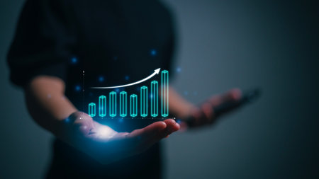 Businesswomen holding virtual graphs, graph analysis of business growth and investment, strategic planning to increase sales profits, long-term business planの写真素材