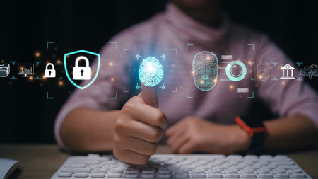Women use fingerprint identification to access personal financial data. for E-KYC electronic know...