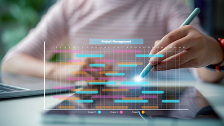 Analyst working with computer in management system to make report with KPI and metrics connected to database. corporate strategy for finance, operations, sales, marketing.Project management concept.の写真素材