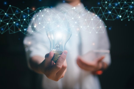 Women holding light bulbs, ideas of new ideas with innovative technology and creativity. concept creativity, Branch with bulbs that shine glitter.の写真素材