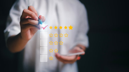 Women giving five yellow stars indicate the highest level of customer satisfaction and evaluation for a high-quality product and service on a futuristic virtual interface screen.の写真素材