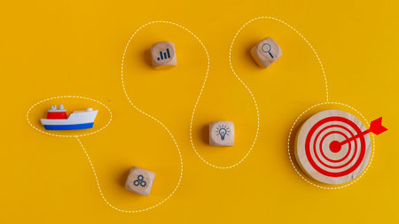 Leader boat leading, on a yellow background. Goal and target, success and business target concept, project management, and company strategy. Leadership concept.の写真素材