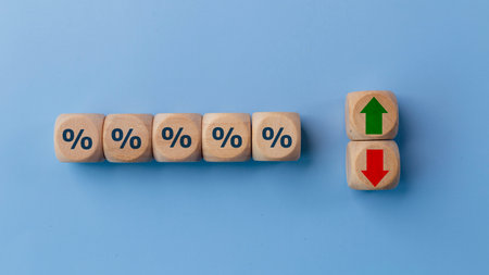 Cube block with percentage symbol icon. Interest rate financial and mortgage rates concept. Wood cube change arrow down to up. Interest rate, stocks, ranking. Business and finance concept.の写真素材