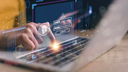 Cyber security, data protection concept. Women using fingerprint identification on laptops to access...