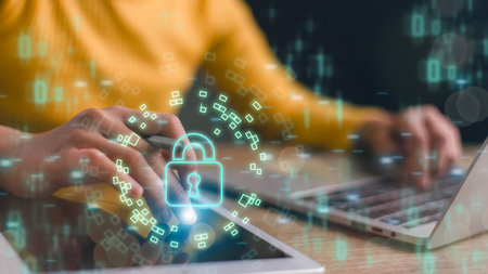 Cyber security, data protection concept. Women using fingerprint identification on laptops to access...