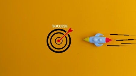 Business for the successful concept. plane with a Target icon and success word yellow background.