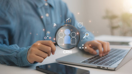 Businessman show CRM Customer Relationship Management for business sales marketing system concept presented in futuristic graphic interface of service application to support CRM database analysis.の写真素材