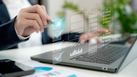 checklist and clipboard task documentation management, business people working laptop checklist questionnaire assessment form, online survey online exam Choosing the right answer in the examの写真素材