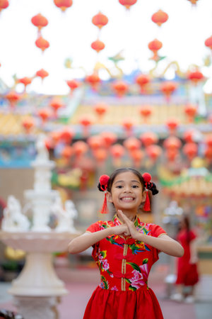 young Chinese girl with traditional dressing up celebrate Chinese new yearの写真素材