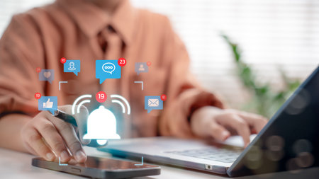 User receiving multiple app notifications on smartphone with social media, chat, email, and location alerts. Concept of digital communication, message center, and mobile interaction.の写真素材