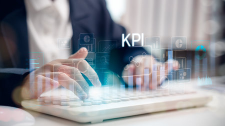 KPI performance dashboard on digital interface with business data metrics and analytics. Manager typing on keyboard to monitor key indicators, tracking growth, goals, and productivity in real-time.の写真素材