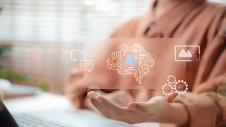 Futuristic AI technology interface with human hand holding virtual digital brain circuit, representing artificial intelligence innovation and automation system.の写真素材