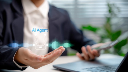 Businessperson using AI Agent virtual assistant with voice waveform interface. Concept of artificial intelligence support, voice bot, smart customer service, and virtual assistant automation.の写真素材