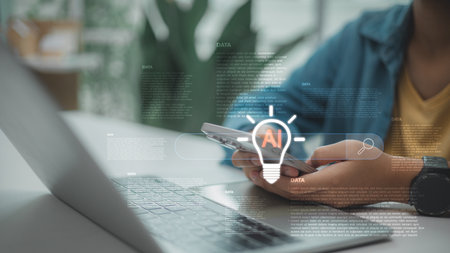 Searching and analyzing data using AI with lightbulb icon on smartphone and laptop, representing...