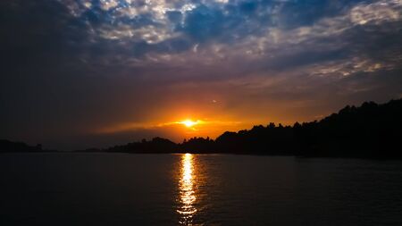 sunset over the riverの写真素材