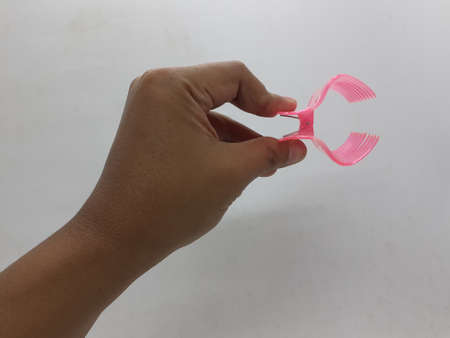 large pink hair pin on white isolation background