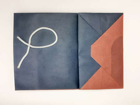 Reusable Blue Red Brown Empty Paper Bag for Various Purpose Container Packaging in White Isolated...