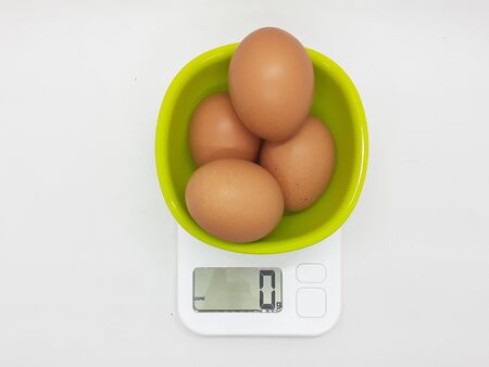 Many Organic Chicken Eggs within One Large Market Basket for Healthy Family Raw Natural Food Material Mealの写真素材