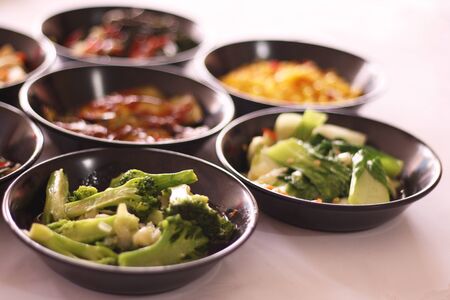 Delicious healthy food on beautiful platesの写真素材