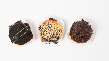 photo of donuts isolated in white background. donuts with a variety of toppings and flavors on top