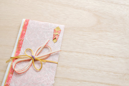 gift box on wood background, top view with copy space.