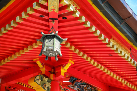 Vermilion shrine buildings and hanging lanterns.の写真素材