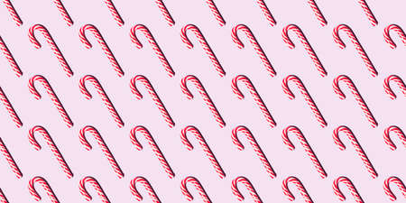 Seamless pattern red and white Christmas candy staffsの写真素材