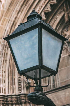 Sculpture of a snake with light on its headの写真素材