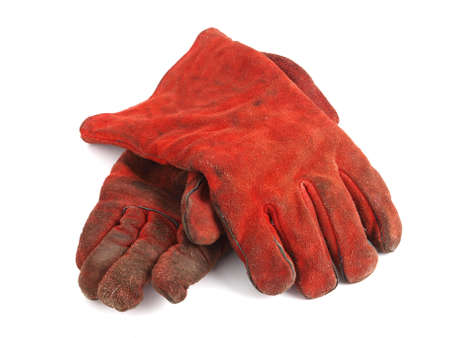 Two red gloves on white background   The gloves are protective wear の写真素材