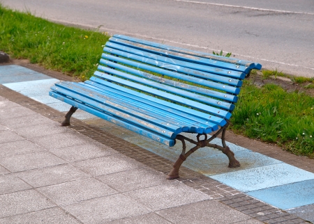 Wooden park bench in nature  A good place to sitの写真素材