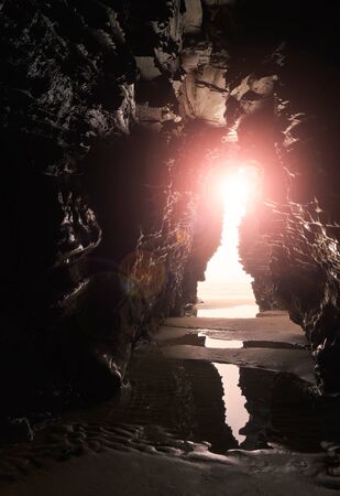 Inside a cave located in Cathedrals beach, in Lugo, Galicia, Spain.の写真素材