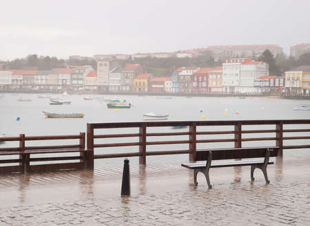 Boardwalk in a rainy day outdoorsの写真素材