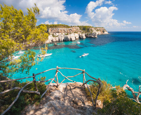 Balcony to mediterranean sea in Cala Macarella in a beautiful summer day.の写真素材