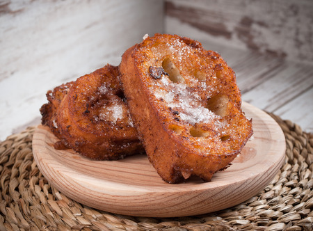 French toasts on a wooden plate