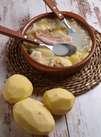 Galician broth on a rustic background. A typical meal of Galicia, Spain.の写真素材