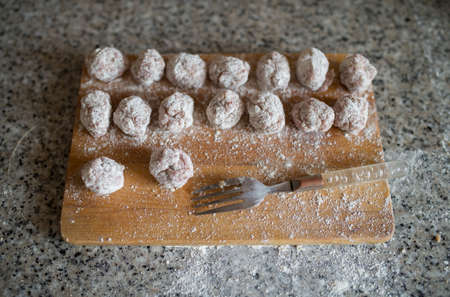 Homemade meatballs ready to be cooked at homeの写真素材