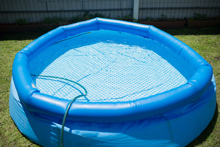 Plastic pool in a summer day outdoors
