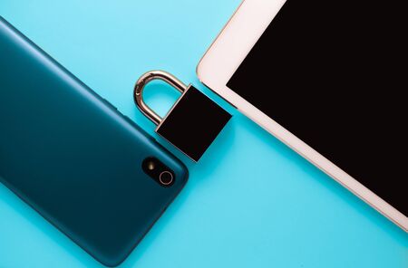 Technology and digital device and security hacking concept with a lock on the screen for digital protection.の写真素材