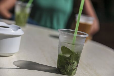 Mojito is a traditional Cuban drink made with white rum, sugar, lime juice, soda water, and fresh mint leavesの写真素材