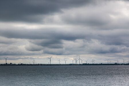 Wind turbines seen from St Lawrence river, Ontario, Canada