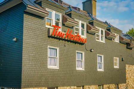 Old building with Tim Hortons logoのeditorial素材