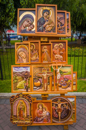 Framed religious art by locals displayed on the street of Lima, Peruのeditorial素材