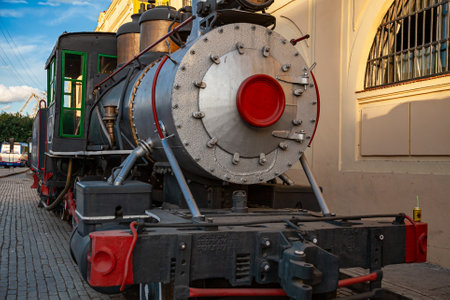 Vintage steam engine locomotive in front of San Jose artisan market, Havana, Cuba