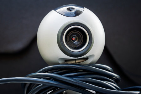 Old model webcam on a dark background