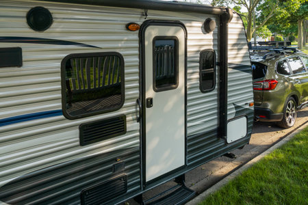 Camping trailer hooked to SUVの写真素材