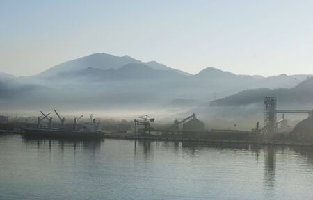 Foggy morning in the port of Manzanillo, Mexico.の写真素材
